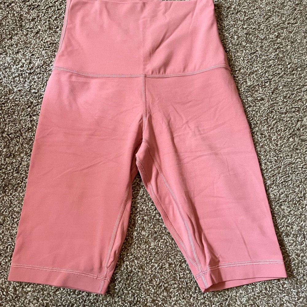 Pink lululemon biker shorts size 4